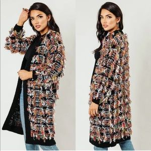 Multi color shaggy sweater. Brand new. Never worn.